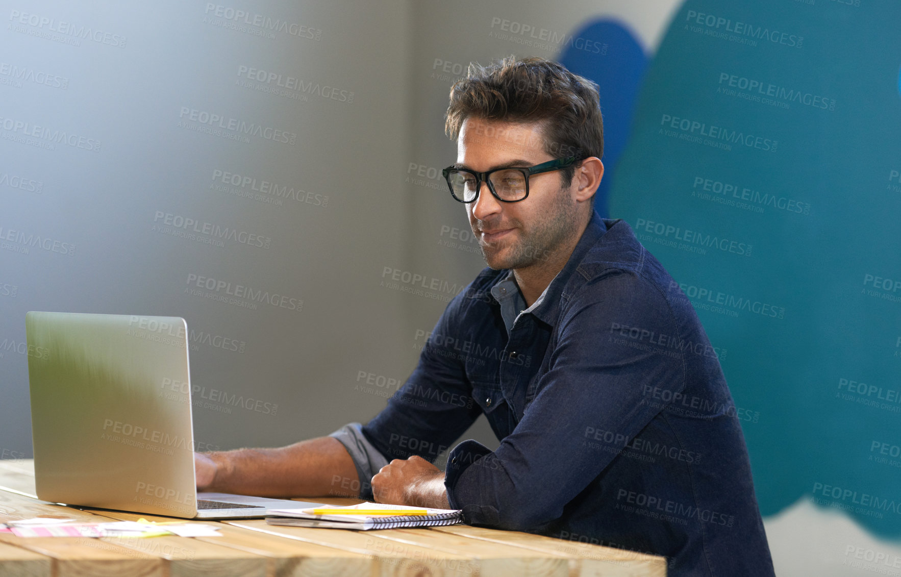 Buy stock photo Smile, creative and man at laptop thinking for ideas, online research and reading email in office with glasses. Brainstorming, computer and designer at desk with business plan in professional career