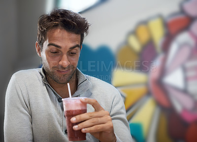 Buy stock photo Happy, drink and smoothie for man with smile for healthy diet of strawberry, fruit and show of beverage. Male person, guy and adult relax with blended cocktail for energy, wellness and nutrition