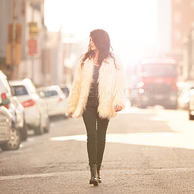 Buy stock photo Woman, fashion and walk on confidence in street with winter or cold weather, street wear and downtown New York. Female person, style and trendy clothes or outfit for city trends and lens flare