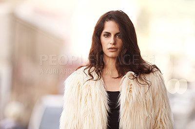 Buy stock photo Portrait, woman and fashion in confidence in city outdoor,  winter and cold weather with street wear and downtown New York. Female person, style and trendy clothes or outfit and fur jacket for trends