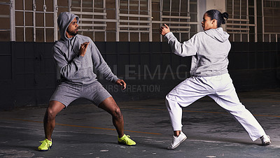 Buy stock photo Martial arts, fight and man with woman, fitness and wellness with cardio or exercise with energy. Challenge, coach or athlete with sports or workout with competition or fighter with skill or training