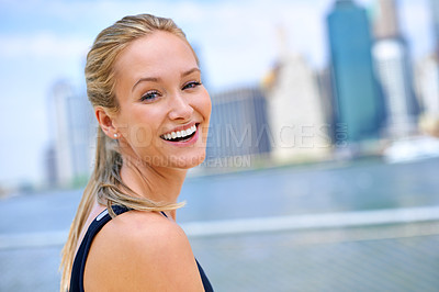 Buy stock photo Woman, fitness and portrait by river in city for morning routine, wellness and exercise for active cardio. Female person, happy and runner or athlete for sports hobby or training workout in New York.