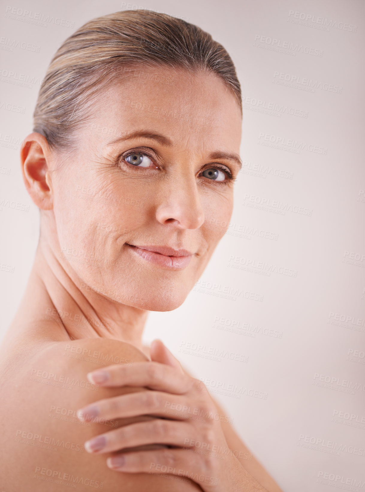 Buy stock photo Studio shot of a mature woman with beautiful skin