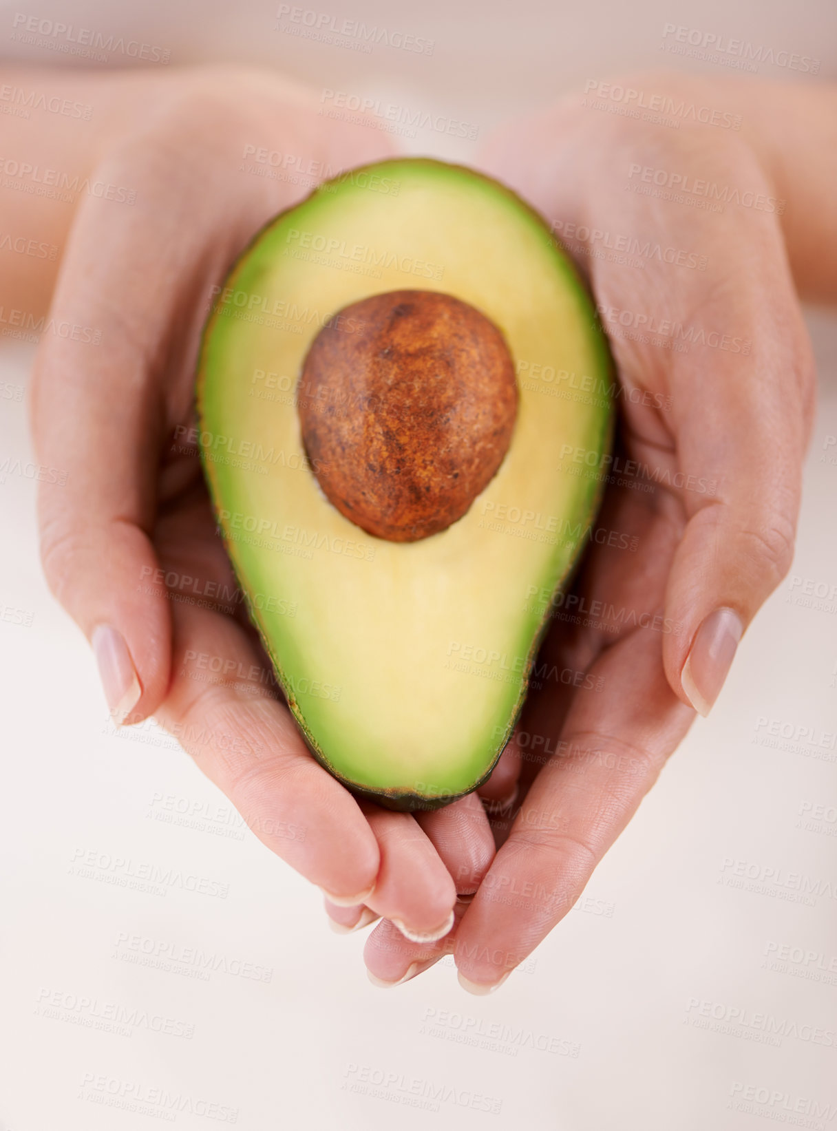 Buy stock photo Hands, avocado and vegetable diet for health, antioxidants and minerals or vitamins for wellness. Closeup, person and holding vegan food for green detox, superfoods and omega 3 for organic skincare