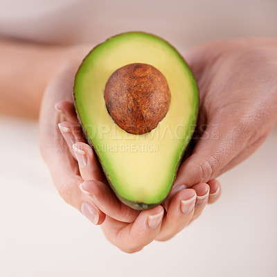 Buy stock photo Hands, avocado and vegetable diet for nutrition, health and minerals or vitamins for wellness. Closeup, person and holding vegan food for green detox, superfoods and omega 3 for organic skincare