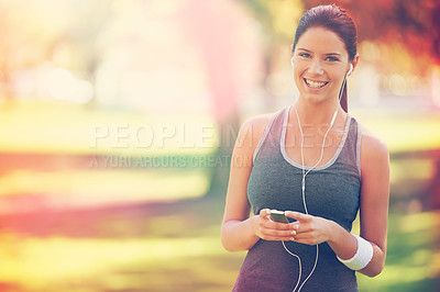 Buy stock photo Cropped shot of a young runner wearing headphones