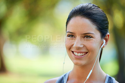 Buy stock photo Woman, earphones and music for fitness in park, closeup and audio inspiration for training in marathon race. Young lady, happy or streaming radio for exercise, commitment or morning workout in nature