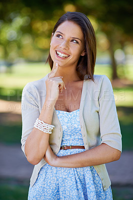 Buy stock photo Happy woman, nature and thinking of outdoor fashion with travel, confidence and summer clothes. Young and casual person in floral dress with smile, inspiration and ideas for style in a park or garden
