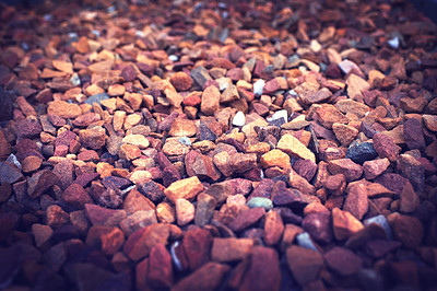 Buy stock photo Gravel, rock and stone on ground closeup outdoor with detail on texture of environment or dirt road. Rocky, material and wallpaper of natural pebbles in nature or background with grit and no people