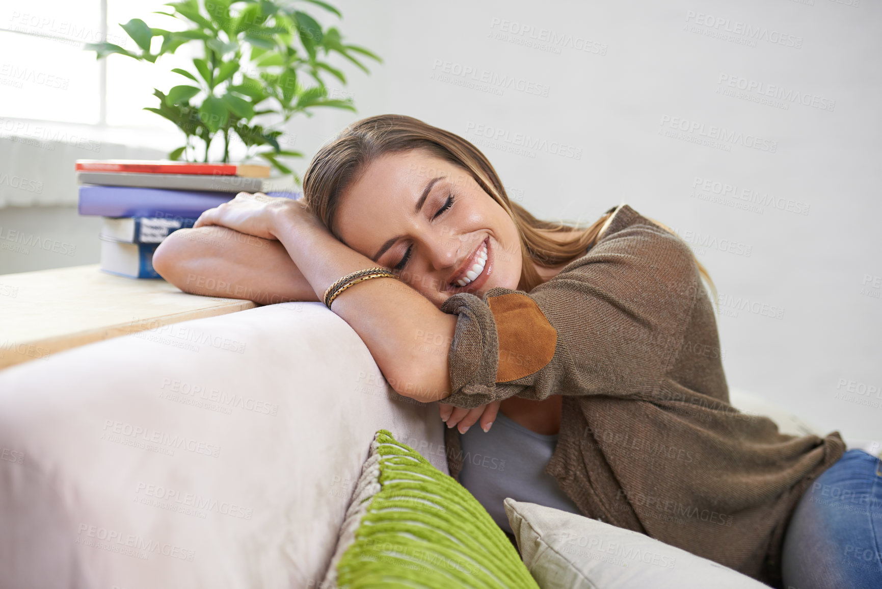 Buy stock photo Calm, happy and woman on couch to relax for comfort or rest on Saturday afternoon, peace and unwind. Female person, chill and sofa to lounge in living room for relaxation, mindfulness and wellness