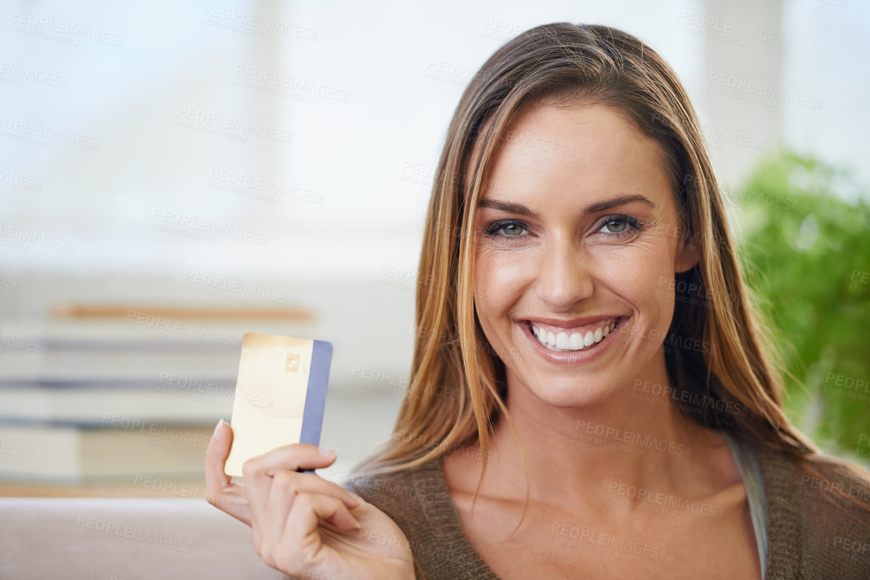 Buy stock photo Portrait of an attractive woman ready to do some online shopping with her credit card