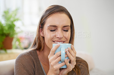 Buy stock photo Coffee, happy and woman in home on sofa with drink, hot beverage and caffeine for breakfast. Morning, apartment and person with tea, mug and calm for relaxing, wellness and health in living room