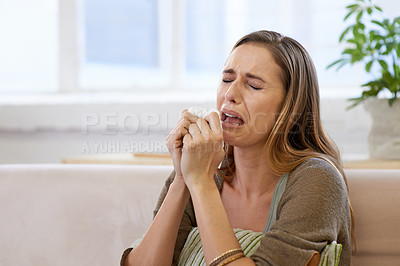 Buy stock photo Woman, crying and emotional distress in home with mental health, depression or broken heart. Female person, tissue and tears in apartment or psychology grief or suffering for worry, loneliness or sad