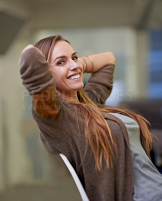 Buy stock photo An attractive female worker having a relaxing day at the office