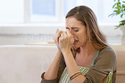 Buy stock photo Woman, crying and emotional in home or tears with mental health, depression or broken heart. Female person, tissue and apartment for stressed grief with upset suffering or worry, loneliness or sad