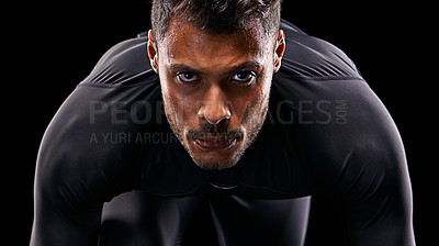 Buy stock photo Portrait, isolated runner and man ready to run, start race and intense focus in dark studio background. Serious, man and running or athlete, cardio or training motivation to win, workout or exercise 
