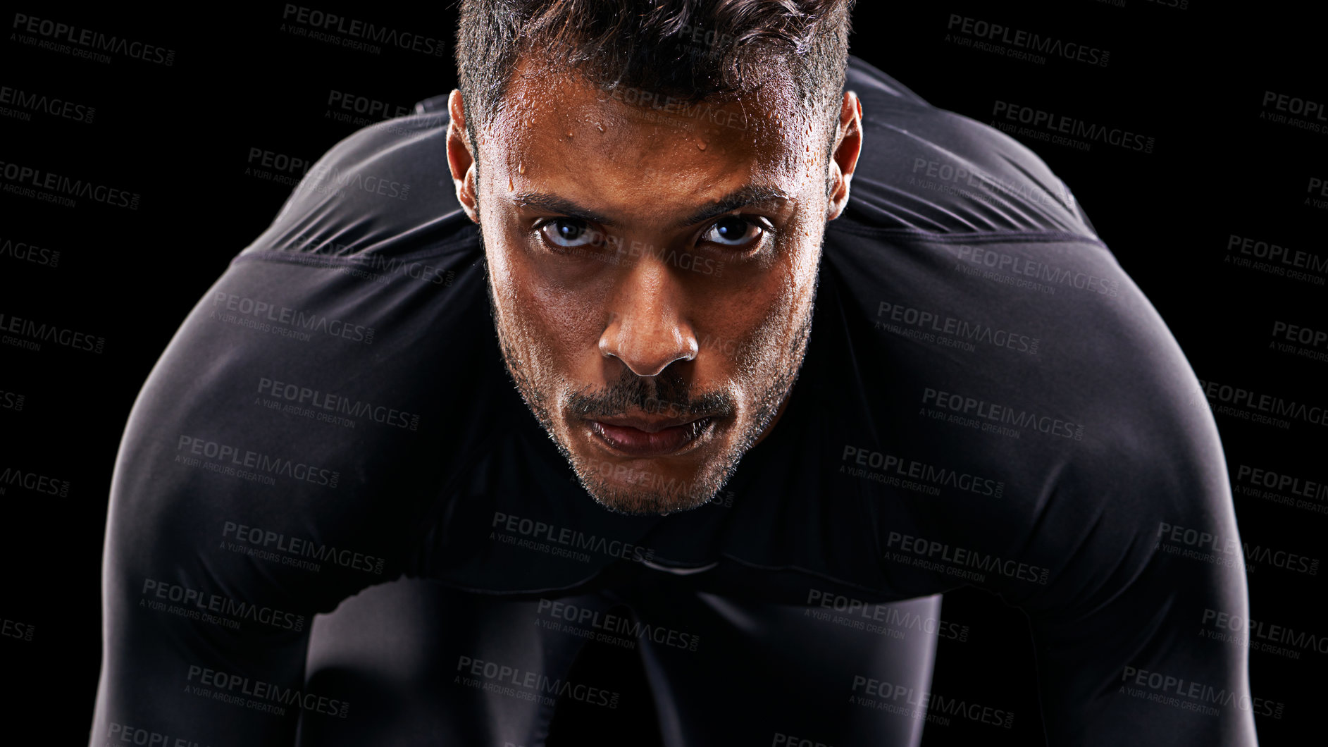 Buy stock photo Portrait, isolated runner and man ready to run, start race and intense focus in dark studio background. Serious, man and running or athlete, cardio or training motivation to win, workout or exercise 