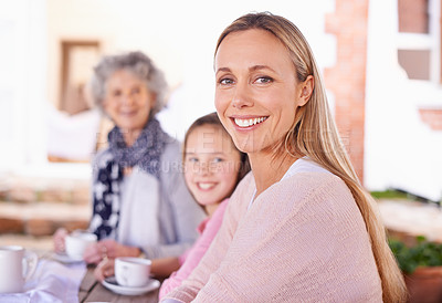 Buy stock photo Portrait, mother and daughter to grandmother, generations and smile for visit at retirement home. Adult, girl and woman with coffee, outdoor and table in backyard for picnic, family and love