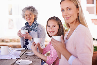 Buy stock photo Portrait, girl or family to relax at tea party in coffee shop as happy, multigenerational or bonding. Child, grandma or mama to drink, hot beverage or smile in retirement, fun or hangout together