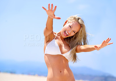 Buy stock photo Woman, portrait and bikini with happiness at beach, fun in the sun and freedom with travel outdoor. Cheers, celebration and swimsuit, care free and excited on adventure on tropical island for summer