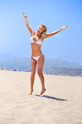 Buy stock photo Woman, jump in bikini and happiness at beach, fun in the sun and freedom with travel outdoor. Cheers, celebration and body with swimsuit, adventure and care free on tropical island for summer