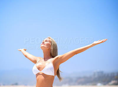 Buy stock photo Woman, beach and outdoor freedom vacation, travel and calm satisfaction for peace and ocean. Female person, arms stretch and smile for holiday by blue sky mockup, nature and relax on tropical island