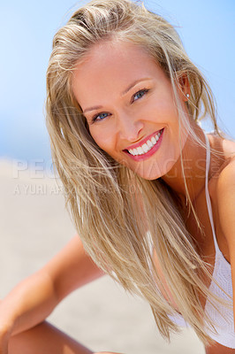 Buy stock photo Woman, portrait and outdoor beach breeze, travel and island for ocean holiday or summer vacation. Happy female person, wind and smile for weekend trip on sand, relax and confidence in outdoor nature