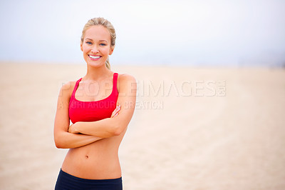 Buy stock photo Woman, portrait and exercise on beach sand with arms crossed, confident and smile with wellness and outdoor. Fitness, athlete and sports with happiness for health, marathon or race for cardio workout