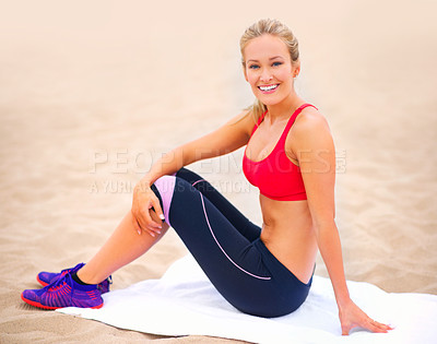 Buy stock photo Portrait, towel and woman in beach for exercise, fitness and training outdoors for fresh air. Female person, happy girl and smile for workout, body health and sports or activity for active lifestyle
