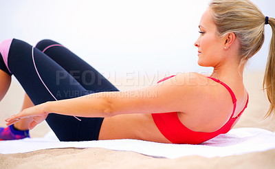 Buy stock photo Crunches, fitness and woman in beach for sports, workout and exercise outdoors for fresh air. Female person, concentration and active as daily routine, body health and training or activity as hobby