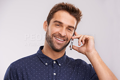 Buy stock photo Networking, communication and portrait of phone call with man in studio, background and mockup. Happy, businessman and contact on smartphone with news, feedback of information or announcement in chat