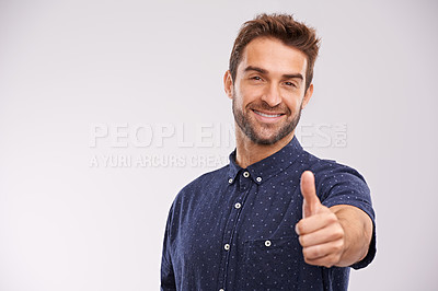 Buy stock photo Support, portrait and man with thumbs up in studio, background and agreement in mockup space. Hand, gesture and happy for success in business with confidence and emoji for ok, thank you and yes