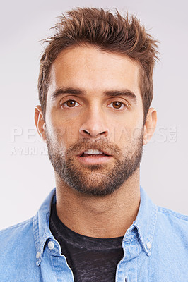 Buy stock photo Portrait, rabbit face and man with expression, reaction and teeth on a grey studio background. Person, model and guy with Easter holiday and bunny with character and casual with humor, joy and funny