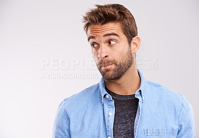 Buy stock photo Thinking, confused and man with ideas, unsure or uncertain on white studio background with solution or emoji. Person, model or guy with thought or question with why and emotion with reaction or doubt