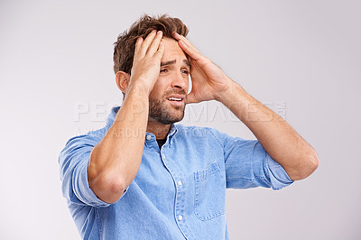 Buy stock photo Stress, panic or sad man with hands on face in studio frustrated by fail, accident or mistake on white background. Anxiety, depression or model overthinking trauma, conflict or overwhelmed by loss