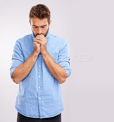 Buy stock photo Man, praying and faith with hope for healing, praise and gratitude to God in religion on white background. Spiritual, prayer and forgiveness with help, advice and guidance for life and belief