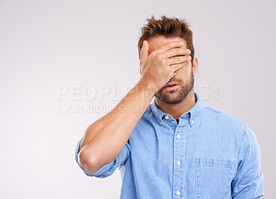 Buy stock photo Mockup, covering eyes and man with regret, mistake and guy against a grey studio background. Male person, model or human with hand on face, frustrated and problem with an issue, upset or disappointed