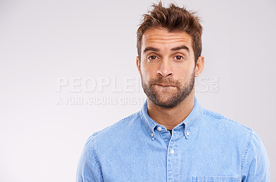 Buy stock photo Studio, portrait and man with doubt, worry and confused on white background with mockup space. Opinion, disappointment and face of guy with decision, conflict or uncertainty for stress, news or ideas