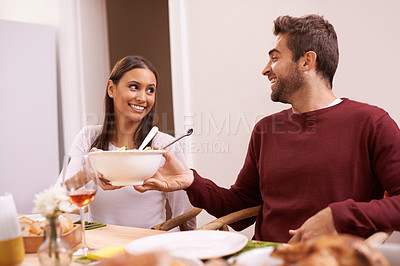 Buy stock photo Smile, dinner and couple at table with salad, food, and drinks for celebration in home. Social event, man and woman at thanksgiving lunch together with wine, relax and romantic holiday date in house