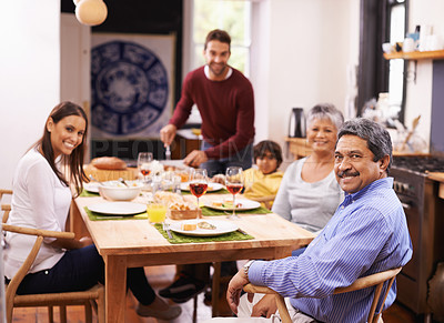 Buy stock photo Happy, portrait and big family with food at dinner table for thanksgiving, bonding or get together at home. Grandparents, parents and grandchild with smile in happiness for meal, feast or weekend