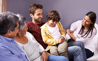 Buy stock photo Happy grandparents, parents and child in home for bonding, relationship and relax together. Big family, senior generation and mother, father and young boy on sofa for holiday, vacation and weekend