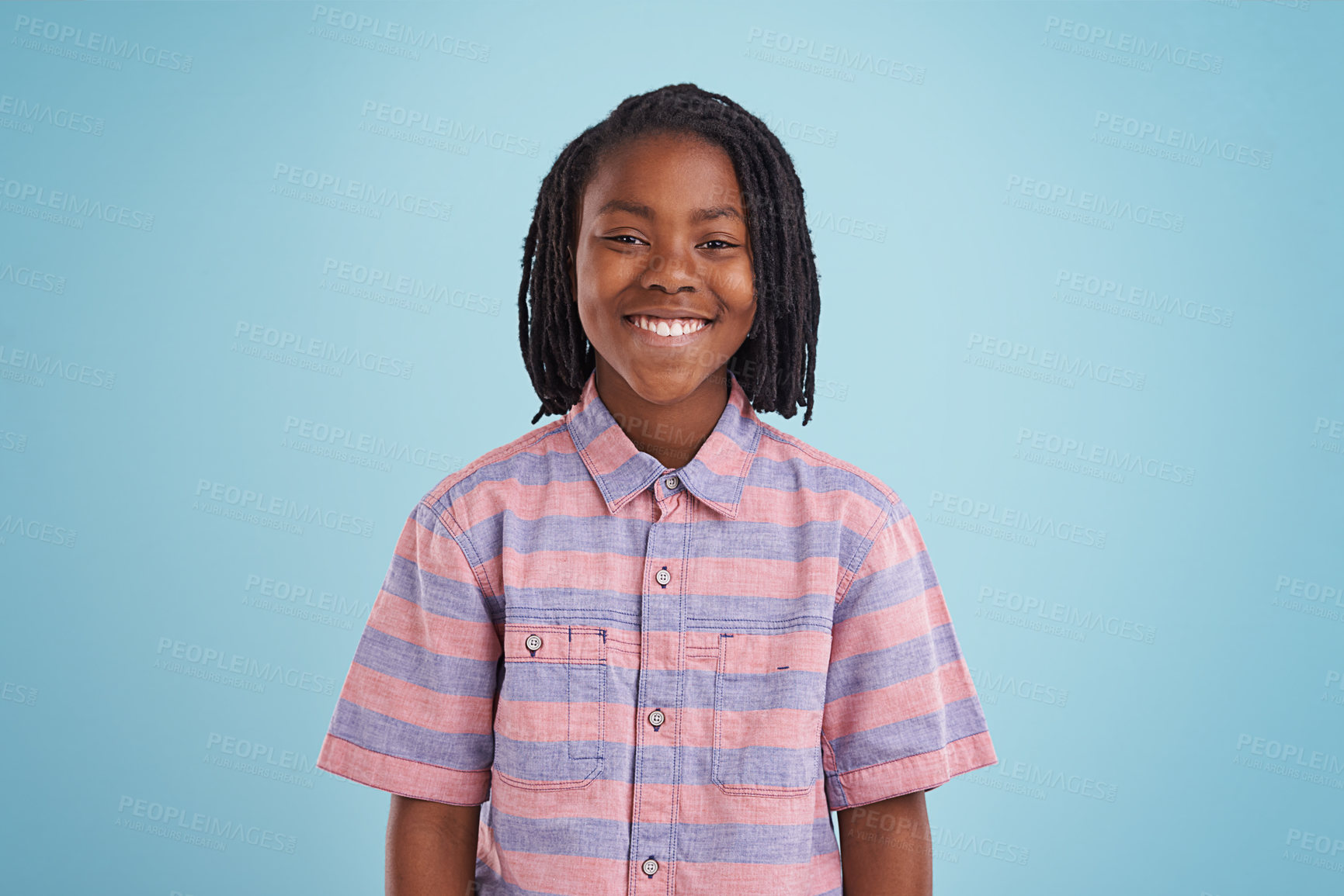 Buy stock photo Boy, fashion and portrait of black child happy in studio with confidence, style or positive attitude on blue background. Face, smile or African teen model with good mood, clothes or outfit choice