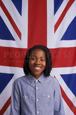 Buy stock photo Child, portrait and happy with UK flag or backdrop for citizenship, government and human rights. Smile and face of black kid, student or boy from united kingdom and Union Jack background for support