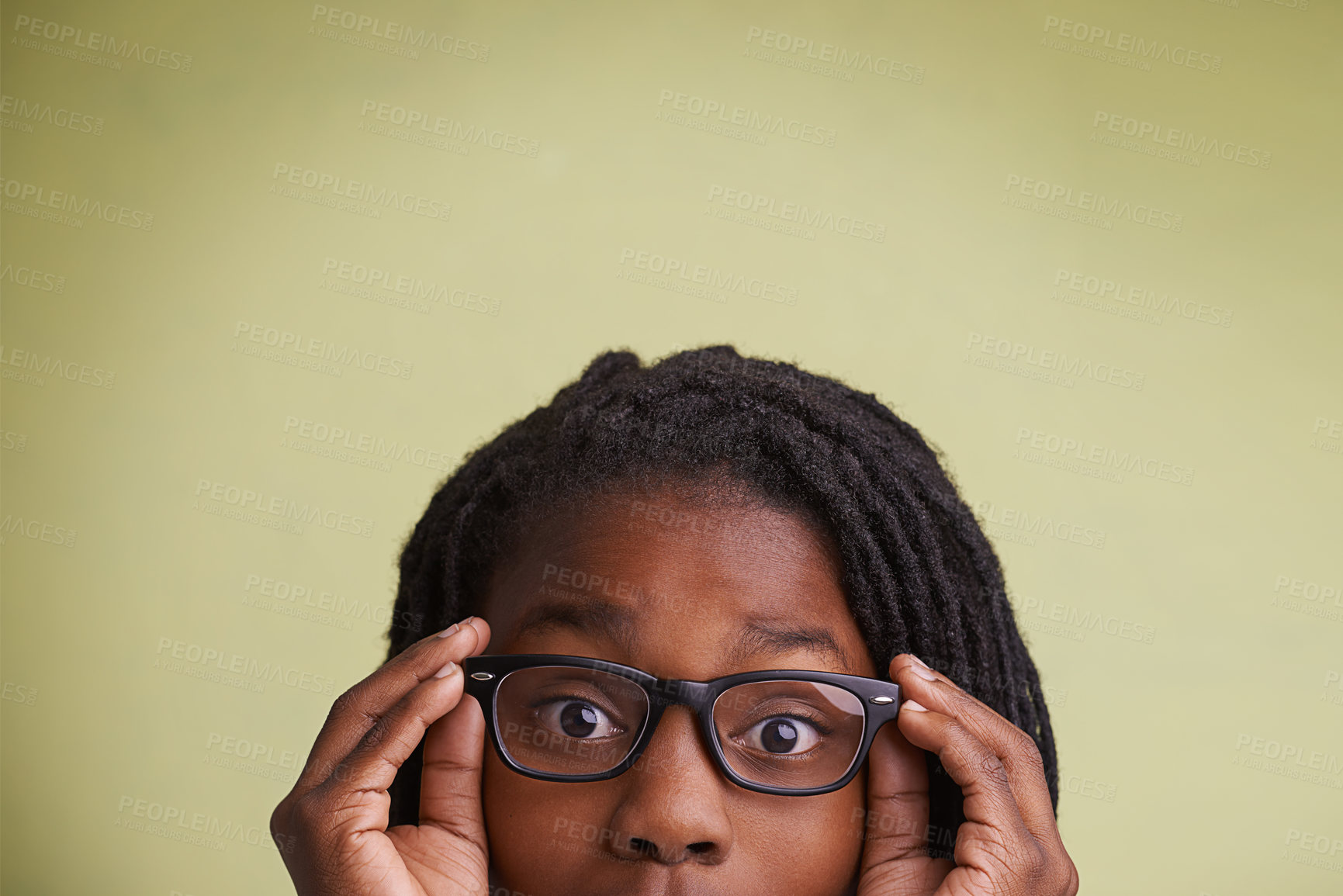 Buy stock photo Glasses, mockup or boy kid portrait in studio for eye care, wellness or optometry on green background. Frame, space or face of teen male model with eyesight, prescription or vision, optics or testing