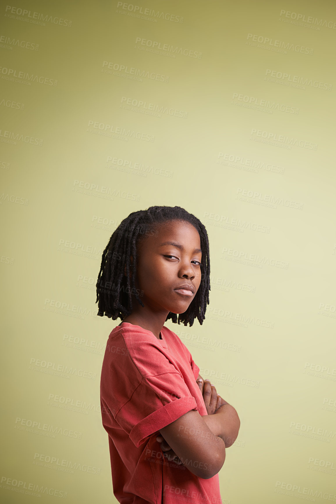 Buy stock photo Portrait, thinking and boy child with arms crossed in studio for solution, confidence or wondering on green background. Doubt, face and African teen model with gesture for suspicious body language