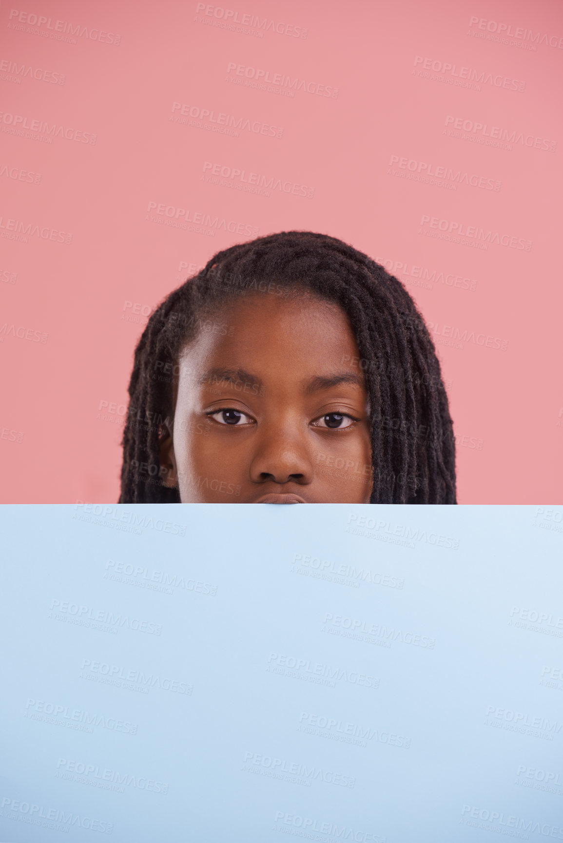 Buy stock photo Poster, portrait or boy child with mockup in studio for announcement, offer or info on pink background. Banner, face or teen model with billboard presentation for news, promotion or voice and opinion