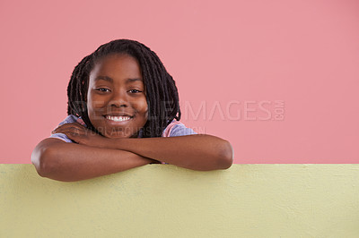 Buy stock photo Banner, happy or boy child portrait with mockup in studio for announcement, offer or info on pink background. Poster, face or teen model smile with billboard presentation for news, promo and opinion 