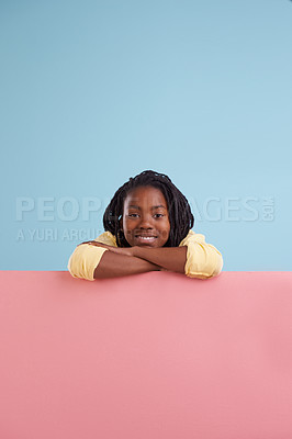 Buy stock photo Portrait, poster or boy child with mockup in studio for announcement, offer or info on pink background. Banner, face or teen model with billboard presentation for news, promotion or voice and opinion