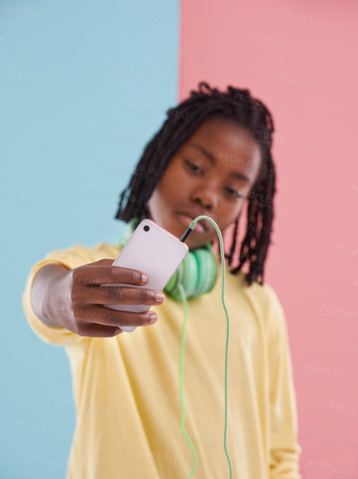 Buy stock photo Teen, student and selfie of boy in studio with headphones for listening to music with lgbt youth in high school. Trans, blog and post on social media about queer identity and pride in profile picture