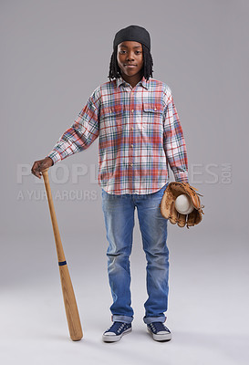 Buy stock photo Baseball, portrait and child in a studio with game, sport and fitness gear with a kid. Youth, equipment and African boy with modern and casual fashion with workout glove and teen with grey background